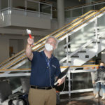 Potts points out the three-dimensional structural details ...