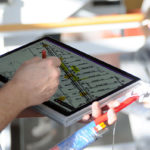 ... while marking their location on building plans for simultaneous viewing on students' devices.