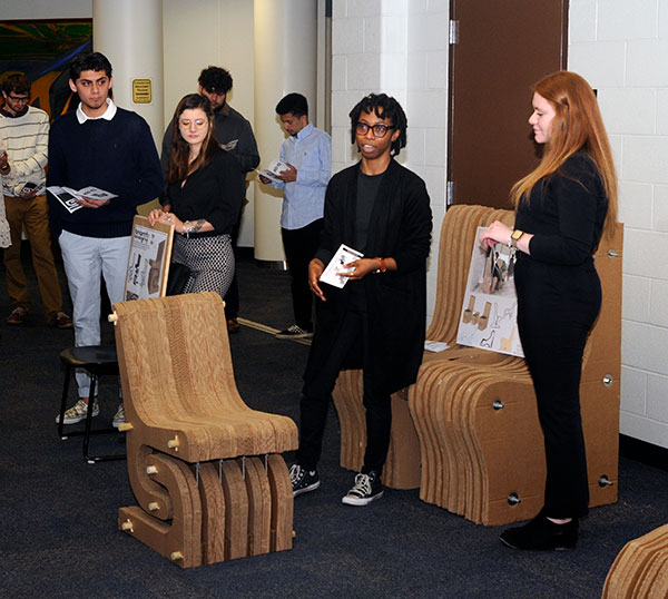 Explaining the design of their Model S-10 chair, which combined sustainability and architecture through 