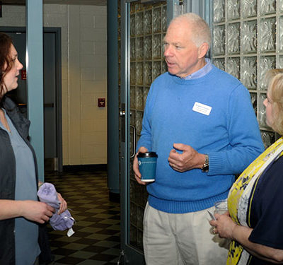 Cementing a community partnership are (from left) Alison A. Diehl, director of Penn College's Clean Energy Center; Duane Hershberger, executive director of Greater Lycoming Habitat for Humanity; and Lester.
