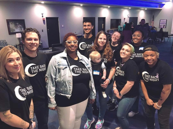 Human Services and Restorative Justice Club executive board officers and volunteer club members gather to honor the evening.