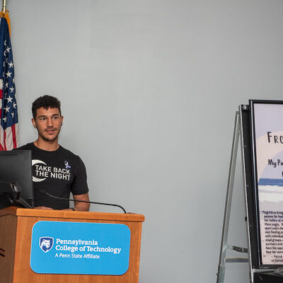 Jorden K. Graham, a freshman in human services & restorative justice, facilitated the middle of the program, featuring survivors’ comments and a candlelight vigil.