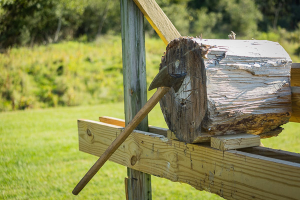 With Penn's Woods all around, a hatchet awaits a willing hand.