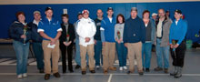 Senior Day participants and their parents, from left, are Brock J. Smith, with Robert and Mary Smith; Brad S. Ferguson, escorted by Brian and Penny Ferguson; James R. Fanelli, with Richard and Judy Fanelli; and Jarrod M. Chandler, with Mark and Jennifer Chandler; and Lindsey K. Fackler