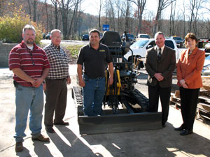 On hand for the donation of a mini excavator are, from left, Claude T. Witts, instructor of diesel equipment technology at Pennsylvania College of Technology%3B Milt Whiteside, retired Case New Holland service manager%3B Jon Hume, CNH product specialist%3B Brett A. Reasner, assistant dean of natural resources management%3B and Mary A. Sullivan, dean of natural resources management.