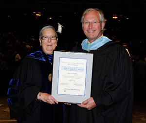 Pennsylvania College of Technology President Davie Jane Gilmour with College Service Award recipient Jim E. Temple.