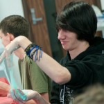 Students explore chemistry in the early childhood education program by making play putty