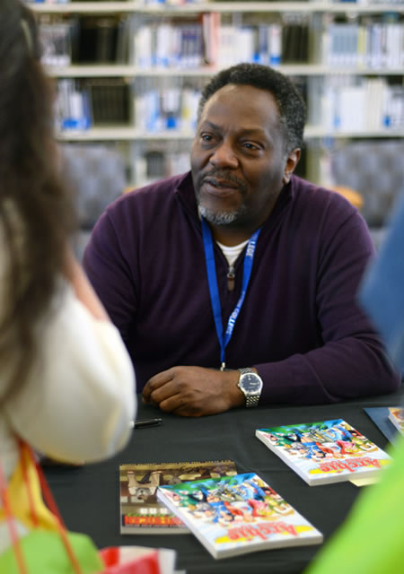 Alex Simmons, at a book signing in the library