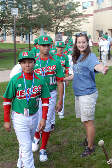 Hillarie A. Hartzell directs the Mexico team to the food tent.