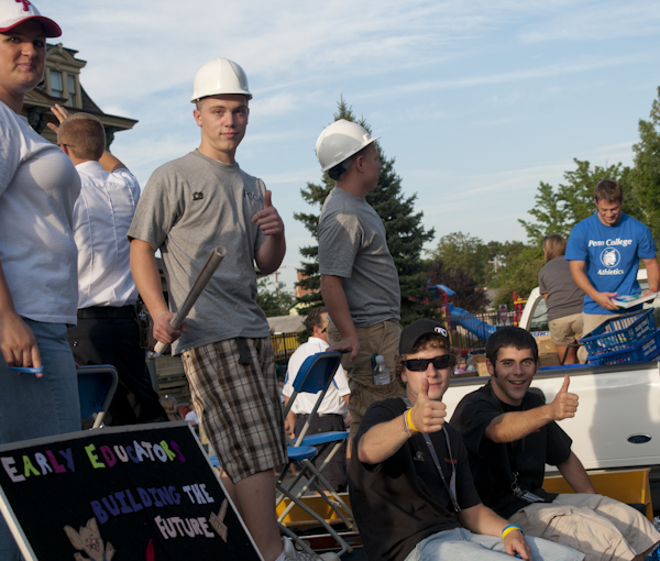 Students from construction and Honda PACT majors offer "thumbs up."