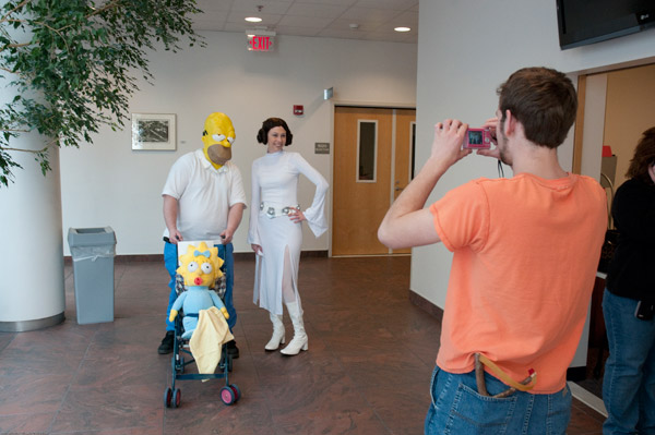 When worlds collide: Homer and Maggie Simpson pose with Princess Leia