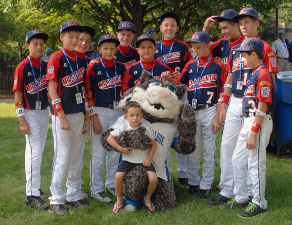 Keystone Little Leaguers gather for a team photo with 3-year-old Marc Molina (great-nephew of Gail A. Ritchey, a Registrar's Office employee) and the college mascot.