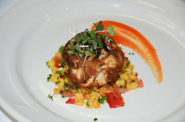 The appetizer course, Maryland crab cake, roasted corn relish and red-pepper coulis, was a tribute to Chef Endys work at the M&T Bank Stadium in Baltimore.