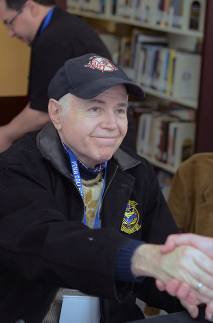 Walter Koenig, whose credits include Pavel Chekov on "Star Trek," greets a fan in Madigan Library.