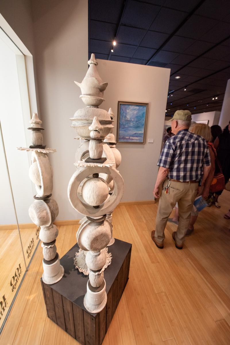 Steve Bower’s steel and clay sculpture, “Imperfect, but Standing Still”