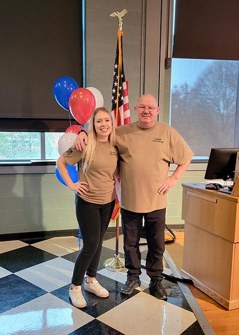 Katie C. Burke, veteran services specialist; and Chet Beaver, assistant director of student advocacy for veteran/military – co-workers and architects of the college's inaugural Veterans Week – pause to celebrate a successful weeklong salute (before planning what to add next year).