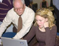 Thomas Zimmerman, associate professor of psychology, assists a student during Drop/Add