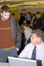 A student consults with Marc E. Bridgens, assistant dean of construction and design technologies