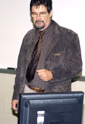 Ian Devenish, director of co-op program and industrial liaison for Central Queensland University in Austrailia, tours a computer lab.