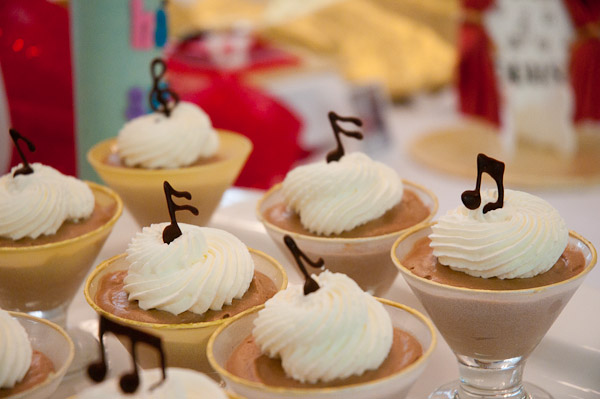 Chocolate notes waltz across whipped cream-topped peanut butter mousse.
