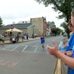 K.C. Shaner is the first team member to cross the finish line.