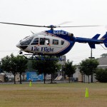 Geisinger Health System's Life Flight helicopter makes its 8:30 a.m. landing on the Madigan Library lawn.