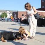 Stacy L. Englert, Le Jeune Chef/hospitality accounting assistant, facilitates some canine-kid chemistry.