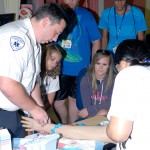 Emergency medical services/paramedic technology student Alonzo T. Estep demonstrates proper procedure for IV insertion.