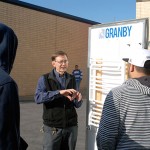 Richard C. Taylor, department head for heating, ventilation and air conditioning, talks with students awaiting a tour.