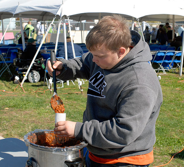 Graham M. Waters, a culinary arts and systems major, was one of 13 chili cooks in the competition.