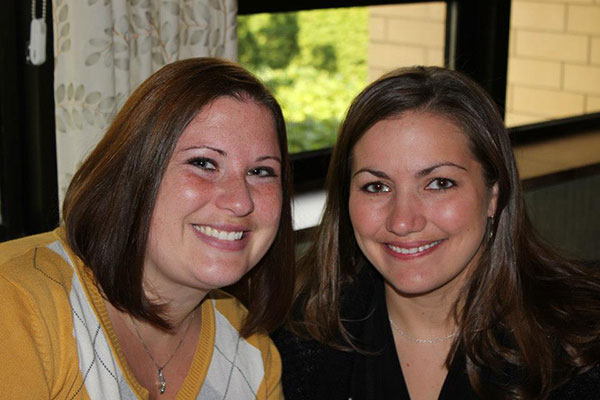 Amber L. Dreese, a 2007 recipient of the Outstanding Varsity Athletic Alumni Award (left), with Maria K. McNett, her friend and former women's volleyball teammate
