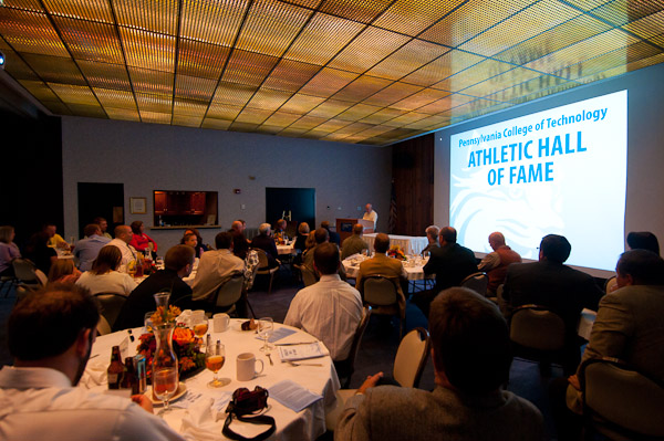 A warm glow falls over the PDC crowd during Saturday night's Athletic Hall of Fame banquet.