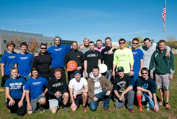 Eight alumni join current Ultimate Frisbee team members and adviser Kirk M. Cantor, professor of plastics technology, for a brisk Saturday morning match.