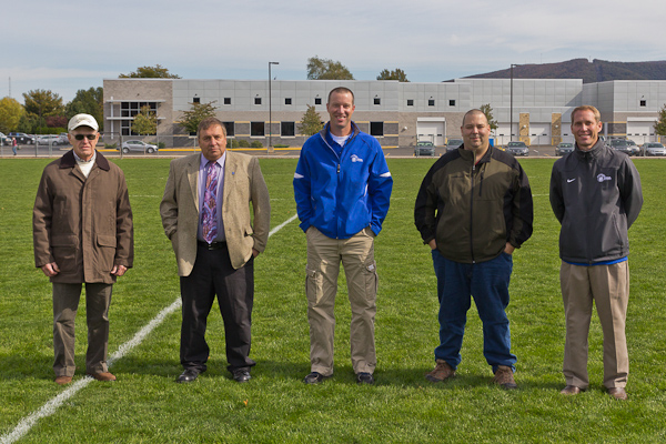 In a preview of the evening's big event, Athletic Hall of Fame inductees are recognized at midfield during an afternoon soccer game.