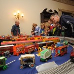 Expo attendees get a closer look at Max E. Ameigh's circus layout during the 2011 Toy Train Expo.
