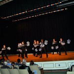 Dancers' audience enjoys a spirited performance.