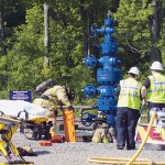 First responders from eastern Lycoming County, among the initial trainees at the new center, prepare to extract a manikin from within a wellhead prop, among the 'injured' in the day's exercise.