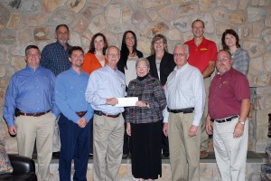 Front row, from left: Robert Walker, H.O. Penn Machinery Inc.; Chris S. Weaver, instructor of diesel equipment technology at Pennsylvania College of Technology; Karl Quinn, Alban Tractor Co. Inc.; Penn College President Davie Jane Gilmour; Ron Garber, Ransome CAT; and Gary Shields, Alban. Back row, from left: Carl Bisesi and Dawn Bernitt-Perito, H.O. Penn; Donna Giletto, Ransome; Patricia Pring and Randy Fetterolf, Cleveland Brothers Equipment Co. Inc.; and Mary A. Sullivan, the college's dean of natural resources management.