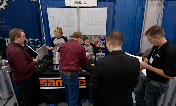 Representatives of Samtec Inc., an Erie-based manufacturer of cables and other electronic connectors, meet with plastics and machining students for internships and co-ops.