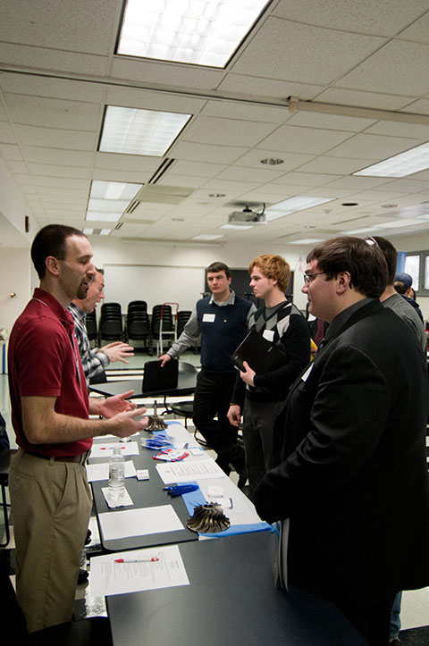 Piedmont Airlines representatives engage a row of aviation majors.