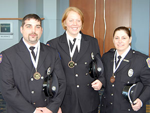 Jessielyn L. Woolbright, ’07 (center), with her bronze-winning JEMS Games teammates, Andrew Vickers and Jill Wix. The three serve Sussex County (Delaware) Emergency Medical Services.