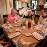 Mentor Annmarie Phillips engages students as they unravel the mysteries of fine dining.