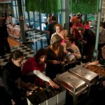 With Penn's Inn converted to a tropical paradise, Happy Hour attendees sample appropriate cuisine.