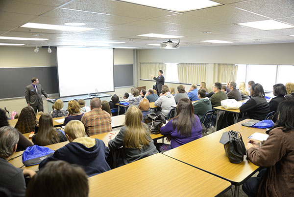 An overview of the School of Business and Computer Technologies was provided by Brian D. Walton, coordinator of matriculation and retention (left), and Edward A. Henninger, dean.