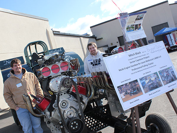 Mitchell T. Black, left, and Bryant M. Deller – each with multiple degrees from the School of Industrial and Engineering Technologies – shared their senior capstone project: a multi-engine gearbox for a professional 