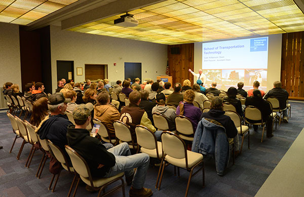 Colin W. Williamson, dean of transportation technology, addresses a packed session in the Thompson Professional Development Center.
