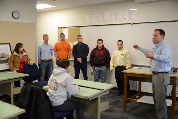Brad Martin, instructor of construction management, answers questions.