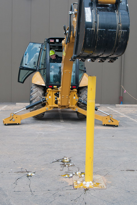 Not cracking under pressure, Dakota J. Griewisch, a freshman in heavy construction equipment technology: operator emphasis from Forestville, N.Y., succeeds in placing an egg into a vertical pipe during the Heavy Equipment Rodeo.  