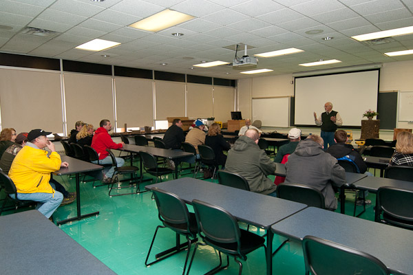 Professor Dennis F. Ringling commands a crowd during a forestry information session. 