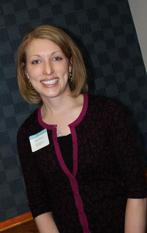Kelly A. Braun, who earned dental hygiene degrees in 2009 and 2010, welcomed ACC visitors with –  no surprise – a warm and winning smile.